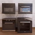 Black Kitchen Appliances Including Ovens And Microwaves In Brick Wall Background With Wooden Floor
