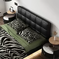 Double Bed With Black Leather Headboard Zebra Print Green Bedding Bedside Tables And Wooden Floor