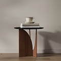 Round Side Table With Black Tabletop Wooden Base Stack Of Books And Cup