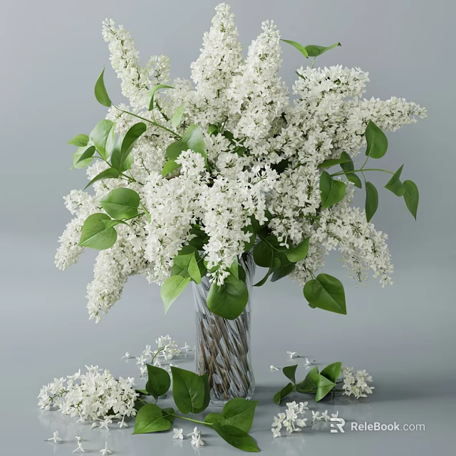 White Lilac Flowers Arrangement in Transparent Textured Vase with Green Leaves and Scattered Blooms 3d model 