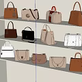 Fashionable Handbags Collection Arranged On White Shelves With Various Styles And Colors