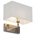 Modern Wall Lamp With White Lampshade And Metal Base On Gray Wall Emitting Warm Light