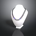 Elegant Decorative Necklace With Black Chain Blue Beads On White Display Stand