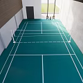Indoor Badminton Court With Green Floor And White Lines For Fitness Training