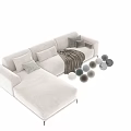 Modern L Shaped White And Gray Two Seater Sofa With Pillows And Blanket