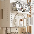 Organized Kitchen With White Pegboard Shelf Silver Circular Items Hooks And Natural Light 3d model