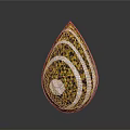 Shiny Teardrop Shaped Decorative Piece With Yellow White Spiral Patterns And Circular Ornament