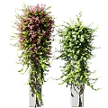 Lush Vines With Pink And Green Flowers Growing On Decorative Pillars