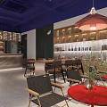 Elegant Café Interior Featuring Blue Ceiling Pendant Lights Wooden Shelves Red Tables And Green Plants