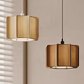 Two Modern Wooden Pendant Lights With Geometric Design And Soft Glow