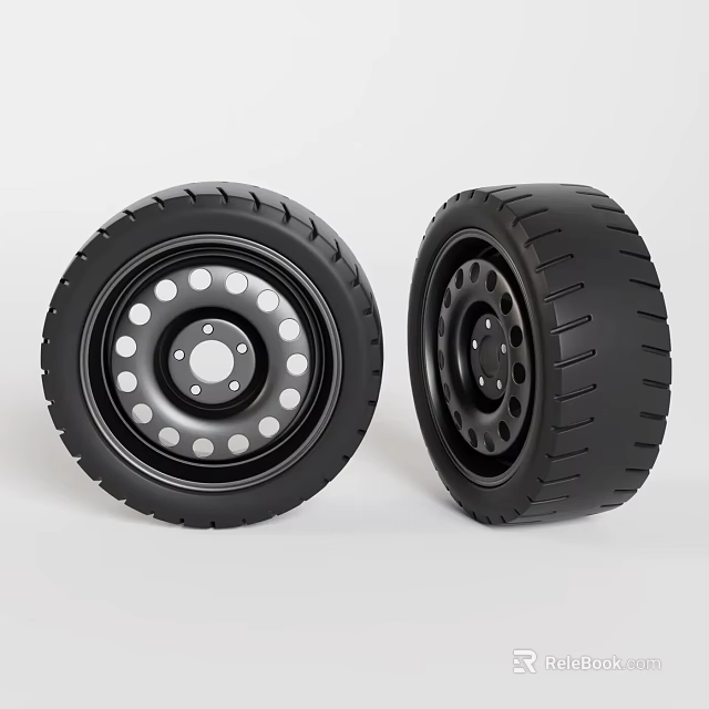 Two black tires displayed side by side with rims featuring holes on surface 3d model
