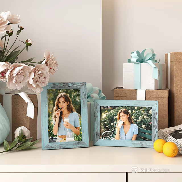 Two Light Blue Photo Frames Displaying Woman Photos With Flower Bouquet Gift Box And Lemons 3d model 