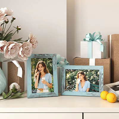 Two Light Blue Photo Frames Displaying Woman Photos With Flower Bouquet Gift Box And Lemons 3d model