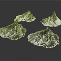 Silver Mountain Shaped Decorative Models With Textured Surfaces Against Black Background