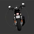 Black Motorcycle with Orange Accents Modern Design Leather Seat and Chrome Exhaust