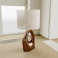 Stylish Modern Table Lamp With Unique Curved Metal Base And White Fabric Shade