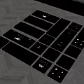 Various Black Electrical Control Panels With Modern Design On Wooden Floor