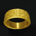 Exquisite Golden Ring With Intricate Textured Surface And Sleek Band Design
