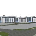 Modern Large Multi Story Industrial Factory Building With White Walls Glass Windows And Green Area