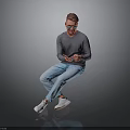 Man Sitting Using Smartphone Wearing Gray Sweater Light Blue Jeans White Shoes Against Gray Background