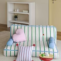 Colorful Living Space With Striped Sofa Pink Heart Pillow Pom Poms Green Lemon And Shell