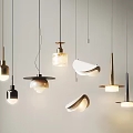 Contemporary Pendant Lights Showcasing Various Metal Glass Designs And Warm Illumination