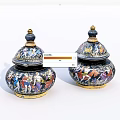 Vintage Ceramic Jars With Colorful Figurine Patterns Gold Accents And Lid Design