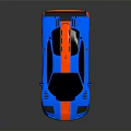 Sleek Blue And Red Sports Car With Black Rear Spoiler Red Wheels And Sporty Design