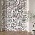 Decorative Stone Brick Wall in Modern Interior with Potted Green Plant and Wooden Floor