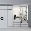 Elegant Modern Shoe Cabinet With Mirrored Doors Circular Handle Drawer Unit And Pampas Grass