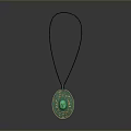 Green Oval Pendant with Central Gemstone and Intricate Pattern on Black Cord