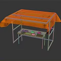 Sturdy Table With Orange Tablecloth And Lower Metal Shelf Featuring Colorful Blocks