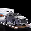 Lexus UX300e Electric Car Displayed On Exhibition Stand With Silver Exterior
