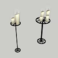 Decorative Candle Holders With White Candles On Black Metal Stands