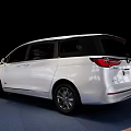 White MPV Car With Sleek Exterior Design And Modern Alloy Wheels