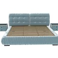 Light Blue Upholstered Double Bed With Tufted Headboard And Nightstands On Both Sides