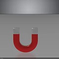 Shiny Red Metallic Horseshoe Magnet With Silver Ends On Dark Background