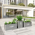 Modern Garden Landscape Design With Silver Planters Green Plants And Building Entrance