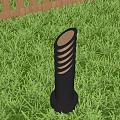 Outdoor Light with Spiral Design and Warm Glow in Green Grass Garden