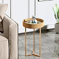 Modern Round Rattan Side Table With Gold Metal Legs And Decorative Ornament