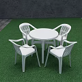 White Round Dining Table Set With Four Chairs On Green Lawn 3d model