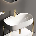 Modern Washbasin Design With White Basin Golden Stand And Round Mirror