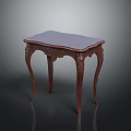 Classic Wooden Table With Carved Legs And Purple Upholstered Top