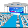 Event Venue Setup With White Tent Stage Blue Floor And Neatly Arranged White Chairs