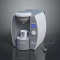TASSIMO Computer Controlled Coffee Machine With Gray White Design Display Screen Buttons And White Cup