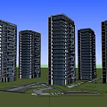 Modern High Rise Buildings With Glass Curtain Walls And Green Trees At Dusk