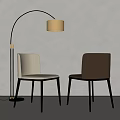 Light And Dark Leather Dining Chairs With Black Legs Golden Floor Lamp Against Gray Wall
