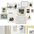 Various Style Frames With Artworks And Photos Hanging On White Wall
