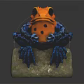 Colorful Frog Sculpture With Orange Blue Skin And Black Spots Sitting On Natural Rock