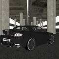 Black Mazda Sports Car Parked Under Concrete Bridge With Scenic Mountain View